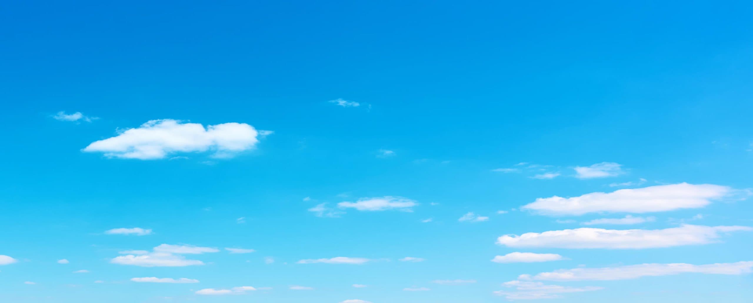 Mildly cloudy blue sky